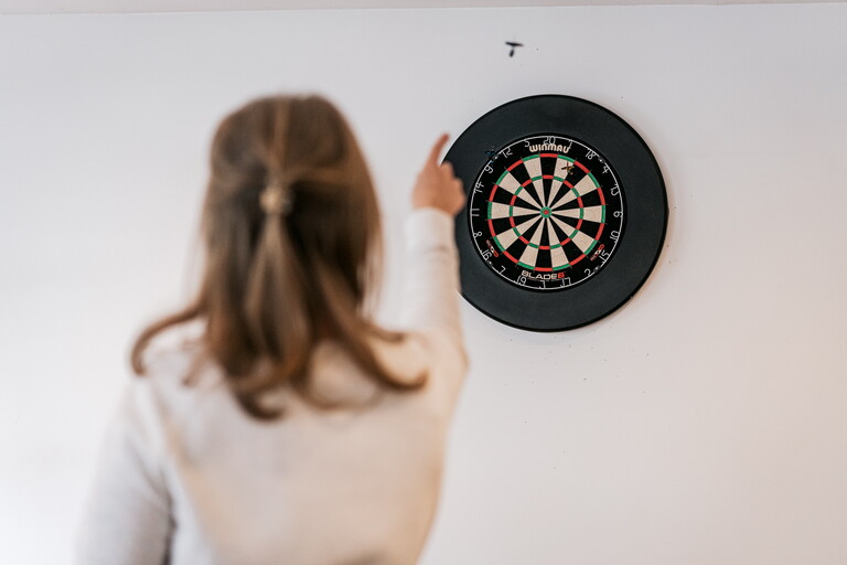 Darts in action